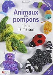 Animaux en pompons dans la maison